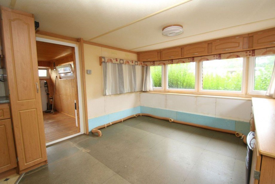 Das Wohnzimmer mit Zugang zum Anbau Bungalow Klein R�nnau