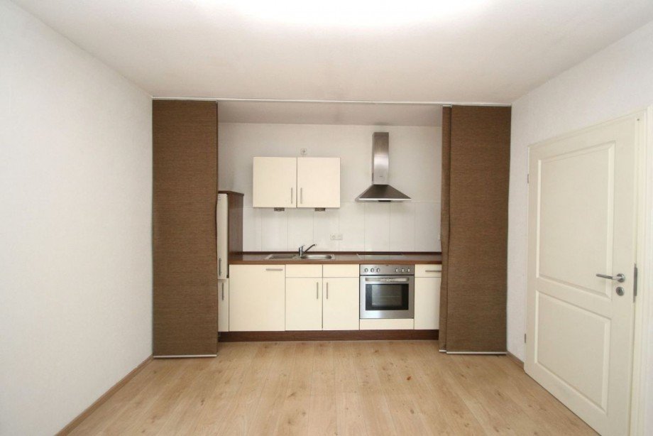 Das Wohnzimmer mit dem K�chenbereich Bungalow Bad Malente-Gremsm�hlen